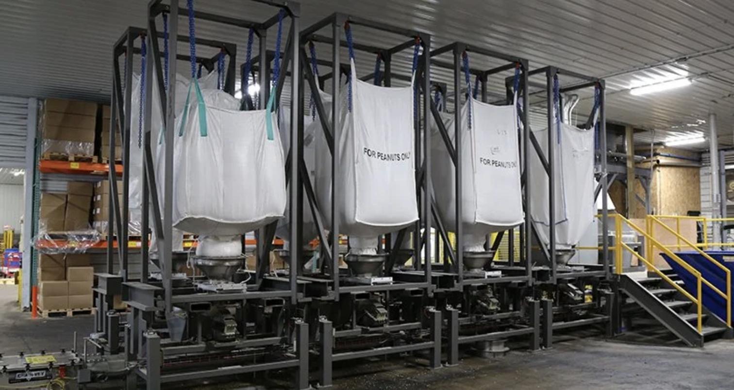 Stony Hill Mixing automated bulk bag batching system with hanging totes in warehouse